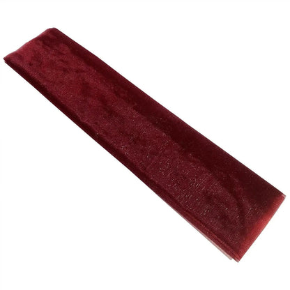 a red velvet headband on a white background