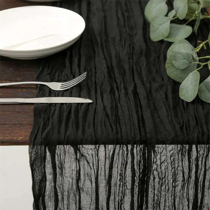 a table topped with a plate and a knife and fork