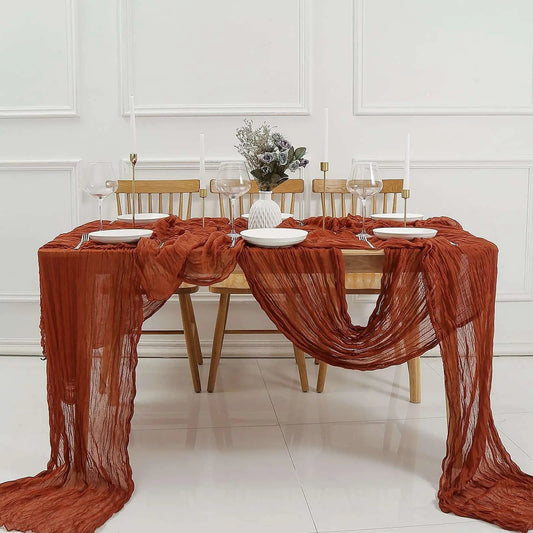 a table with a red cloth draped over it