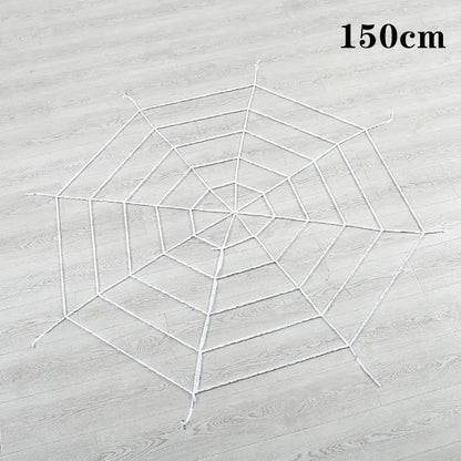 a spider web is shown on a wooden floor