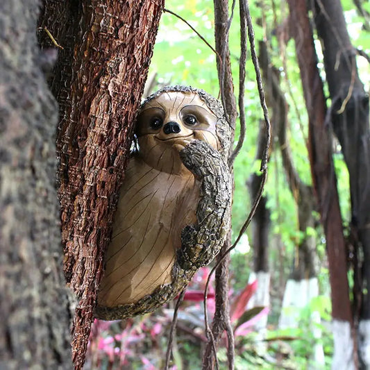 a carved owl sitting on top of a tree