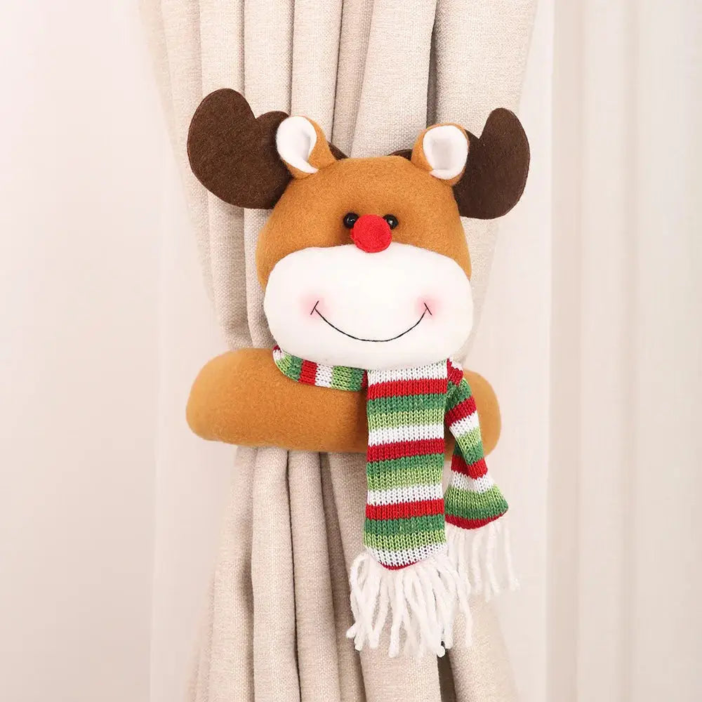 a stuffed animal hanging on a curtain rod