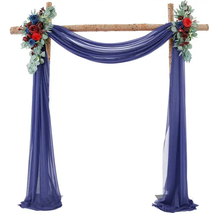 a blue wedding arch decorated with flowers