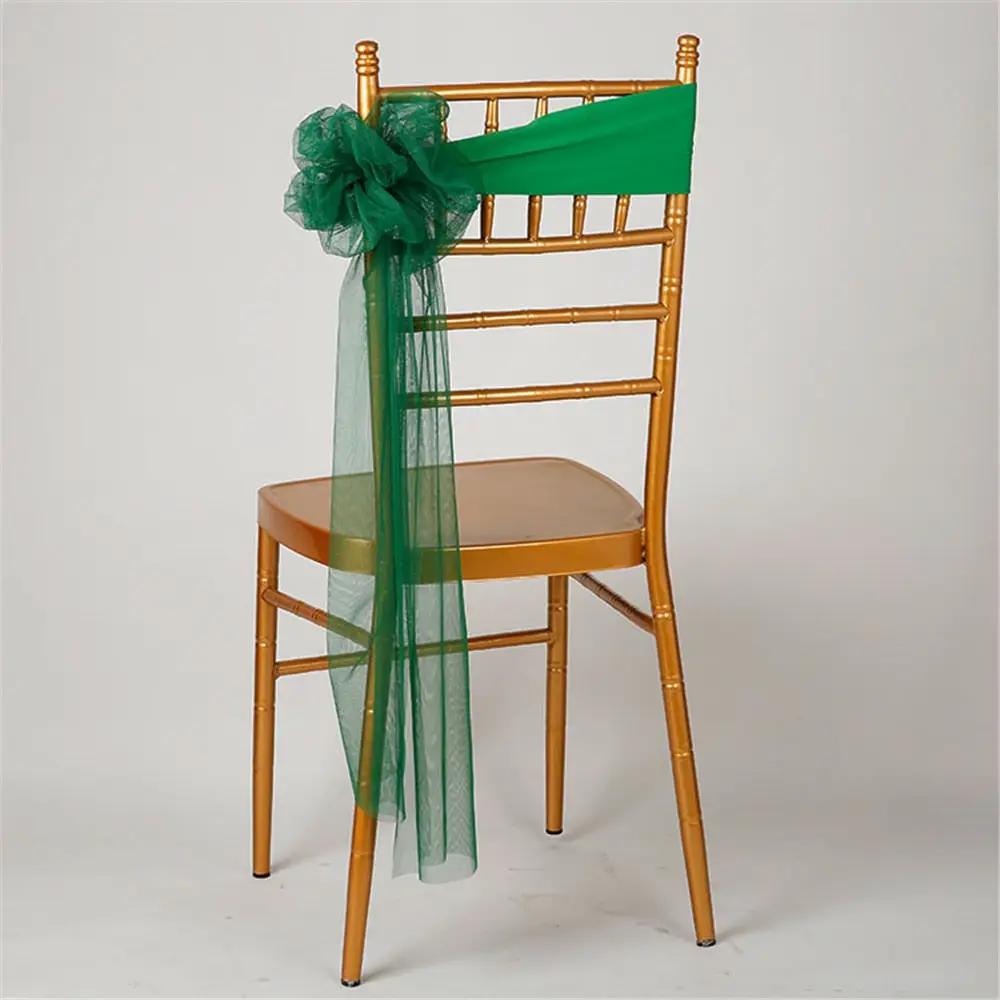 a chair with a green sash on top of it