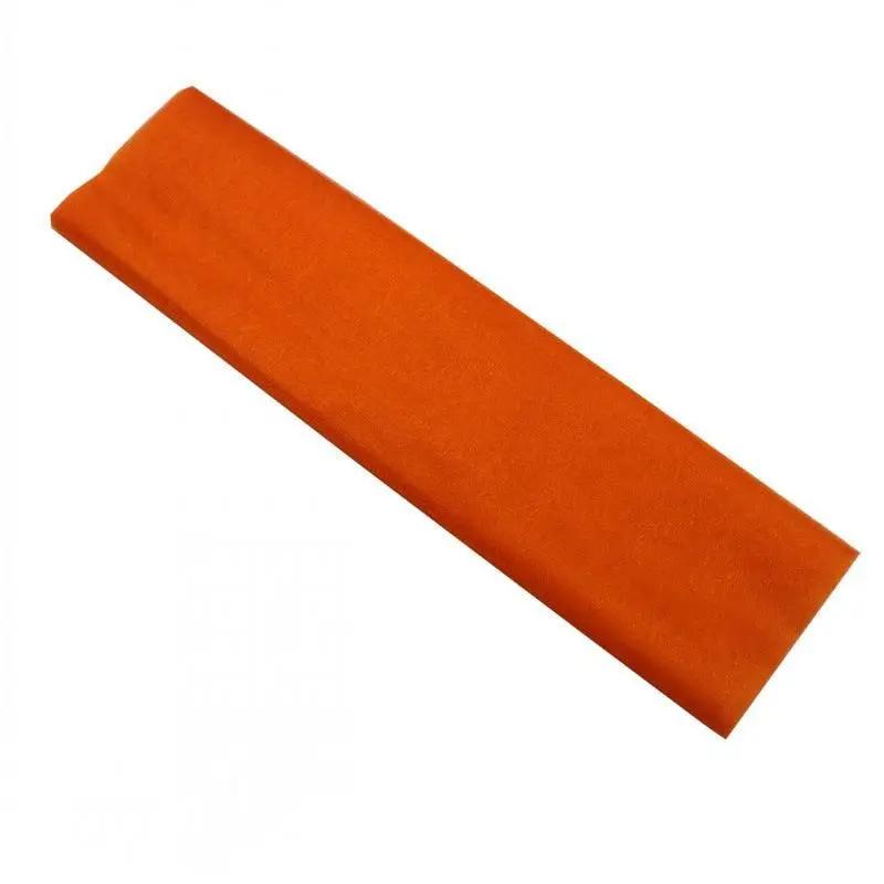 an orange piece of cloth on a white background