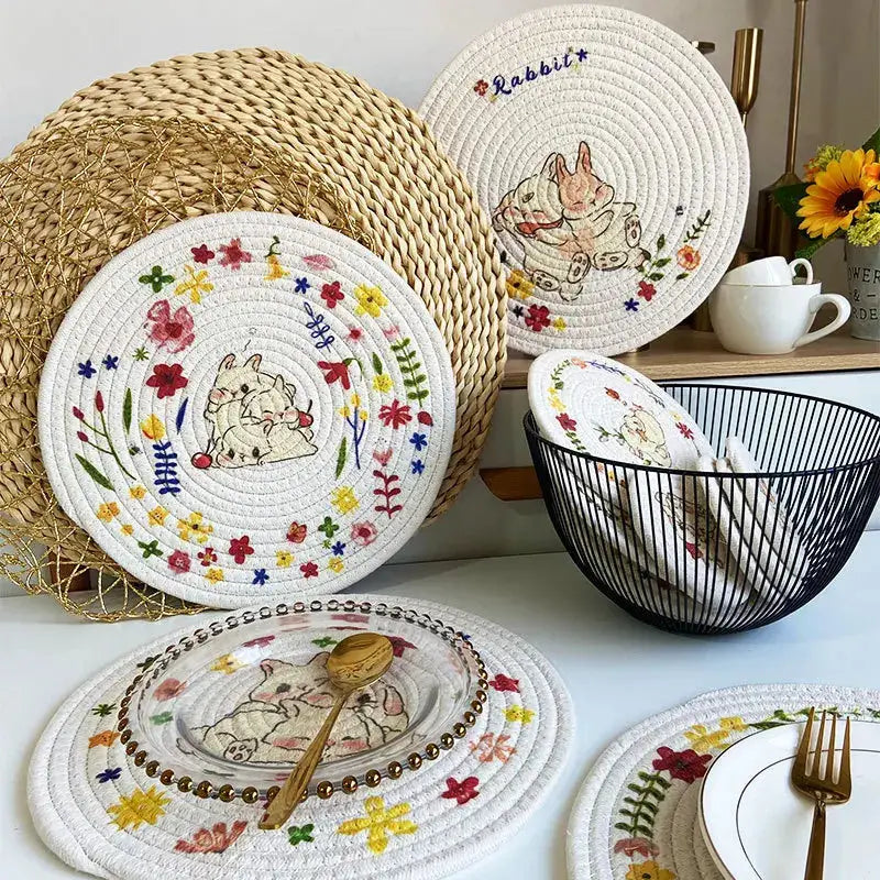 a table topped with plates and baskets filled with food