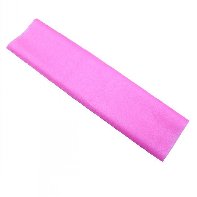 a pink yoga mat on a white background