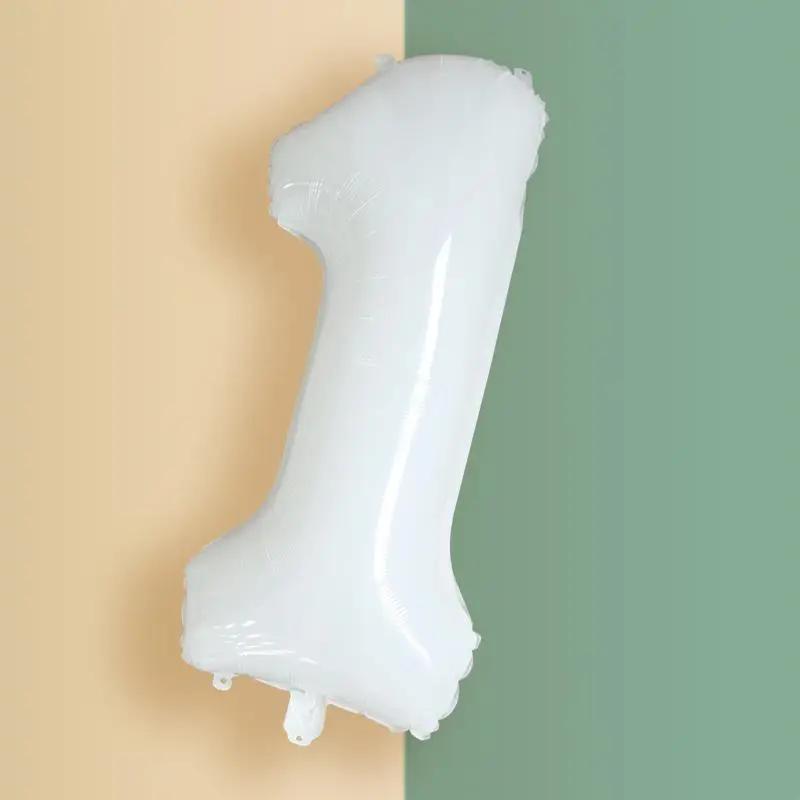a white toothbrush sitting on top of a wall