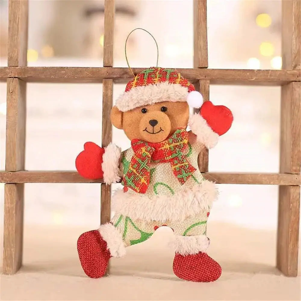 a teddy bear wearing a santa hat and scarf