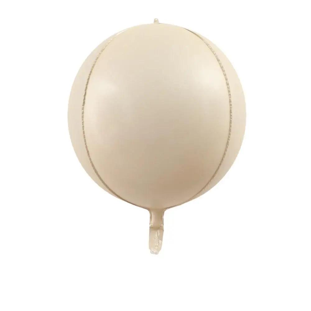 a white ball hanging from a hook on a white wall