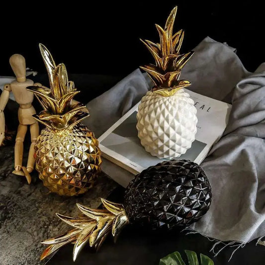 a couple of pineapples sitting on top of a table