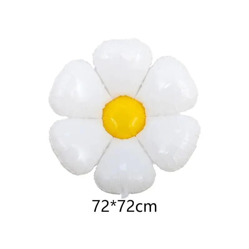 a white flower balloon with a yellow center
