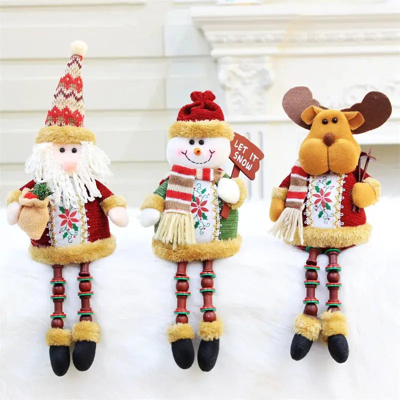 a group of three christmas decorations sitting next to each other