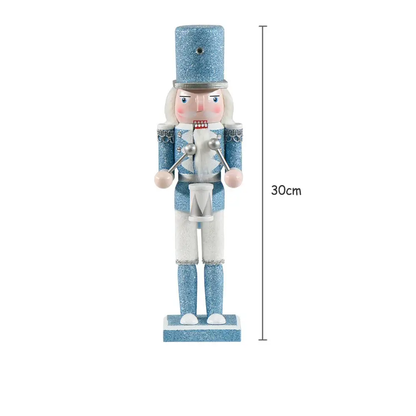 a blue and white nutcracker is shown with measurements