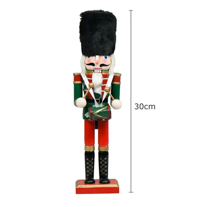 a wooden toy soldier with a green and red uniform