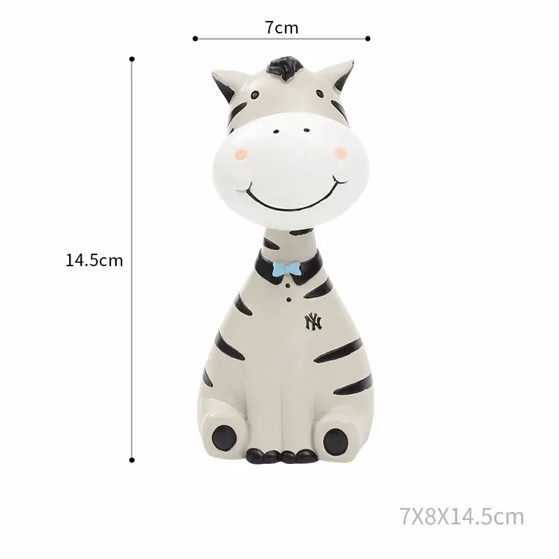 a toy zebra with a bow tie on it's neck