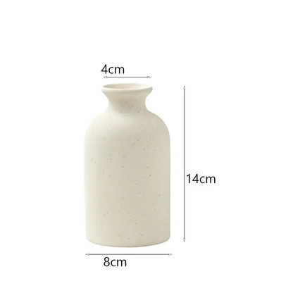 a white vase is shown with measurements