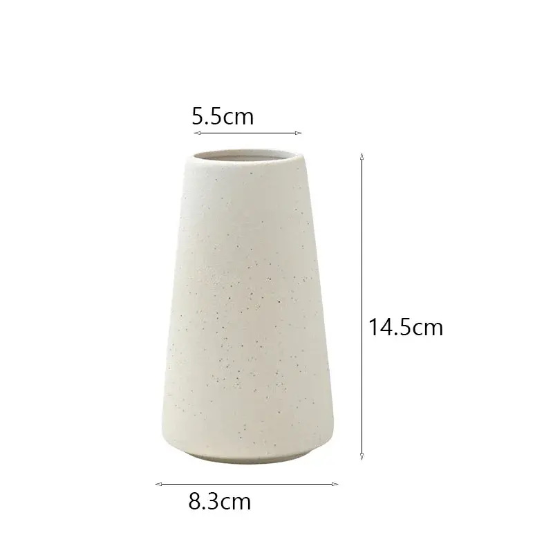 a white vase is shown with measurements