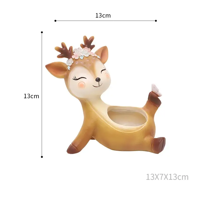 a toy deer with a flower crown on its head