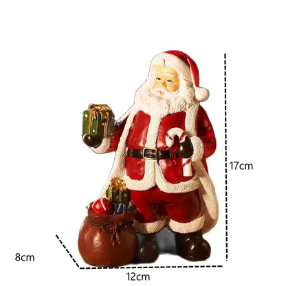a santa clause figurine with a bag of presents