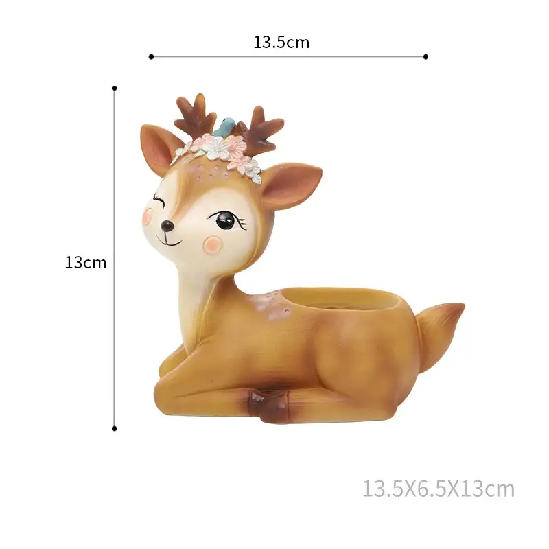 a ceramic deer with a flower crown on its head