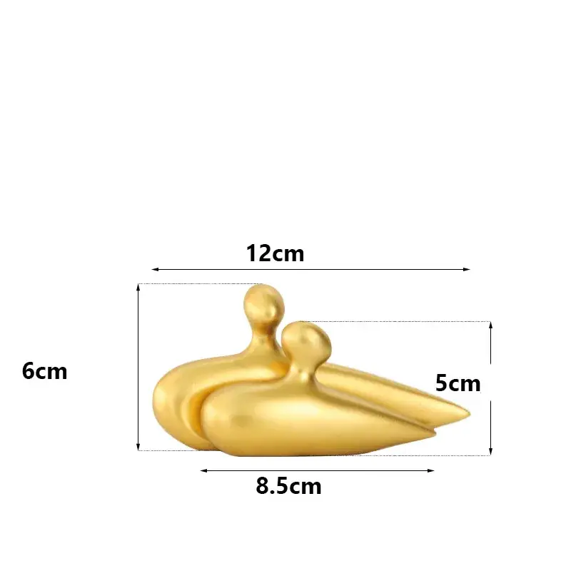 a golden duck shaped object on a white background