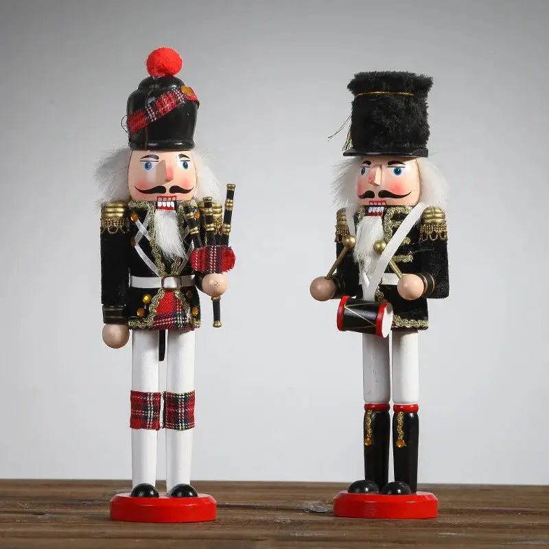 a pair of nutcrackers sitting on top of a wooden table