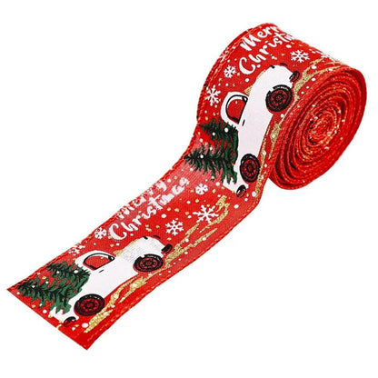 a roll of red christmas ribbon with a cow and trees on it