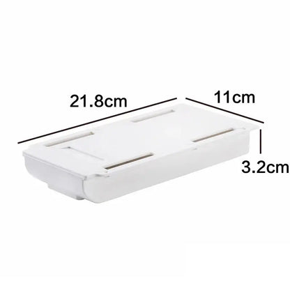 a white plastic box with measurements for the lid