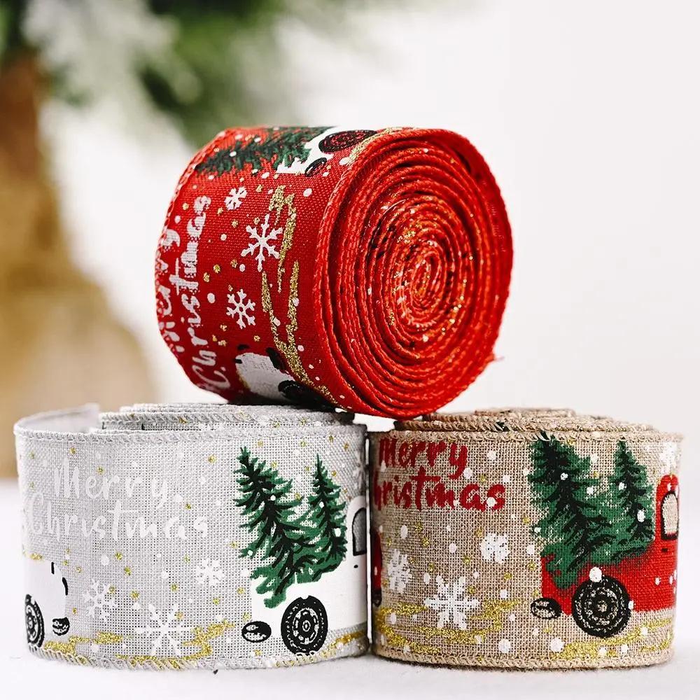a roll of christmas ribbon sitting on top of each other