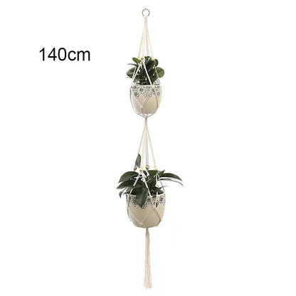 three hanging planters with plants in them