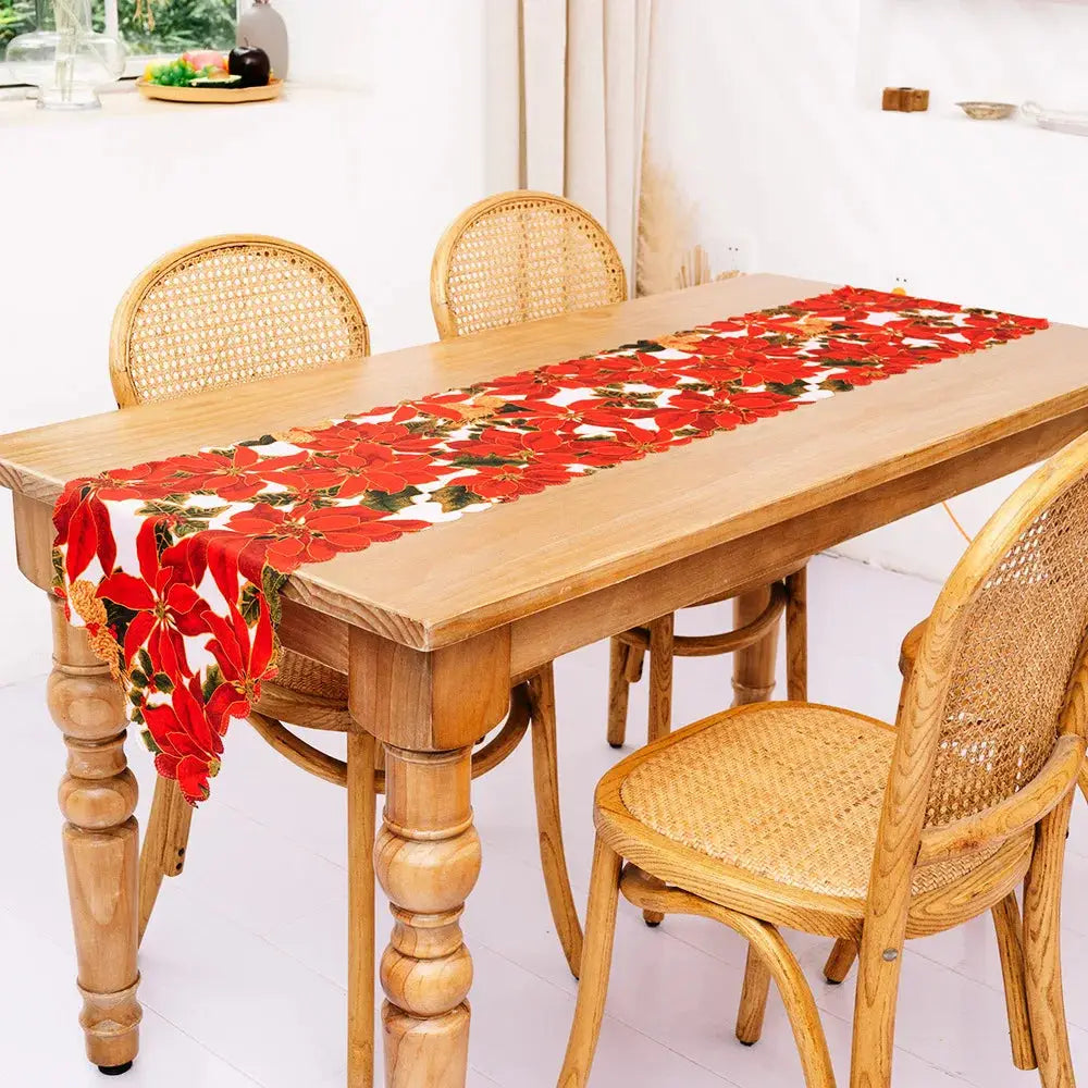 a wooden table with a red table cloth on it