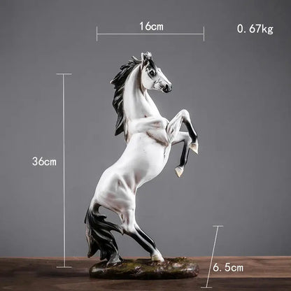 a white and black horse statue on a wooden table