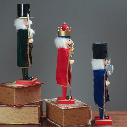three wooden nutcrackers on display on a table