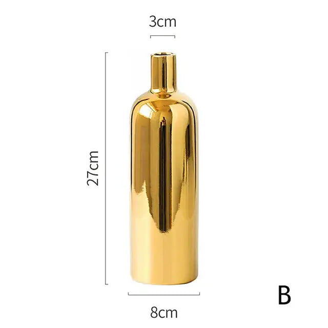 a gold metal bottle is shown with measurements