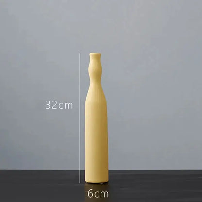 a yellow bottle sitting on top of a table