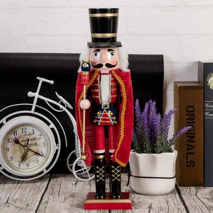 a nutcracker figurine next to a potted plant and a clock