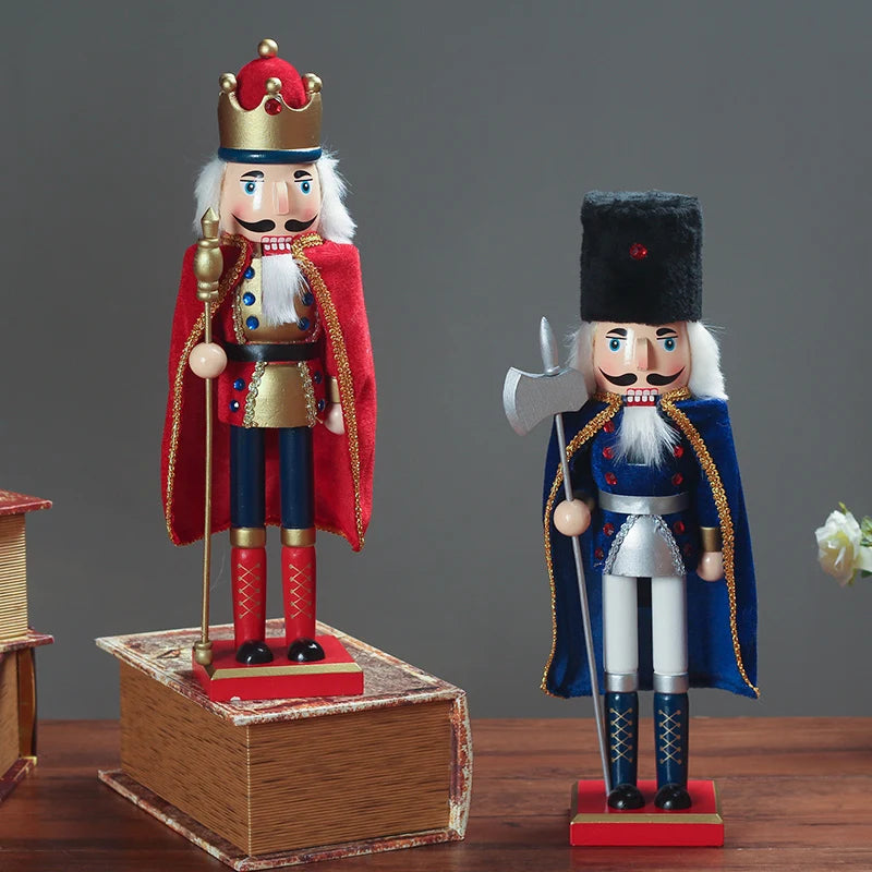 a couple of nutcrackers sitting on top of a wooden box