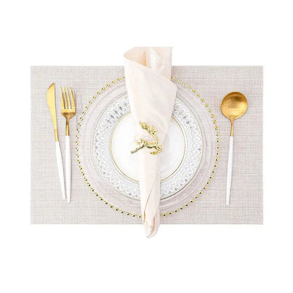 a place setting with a napkin, fork and knife