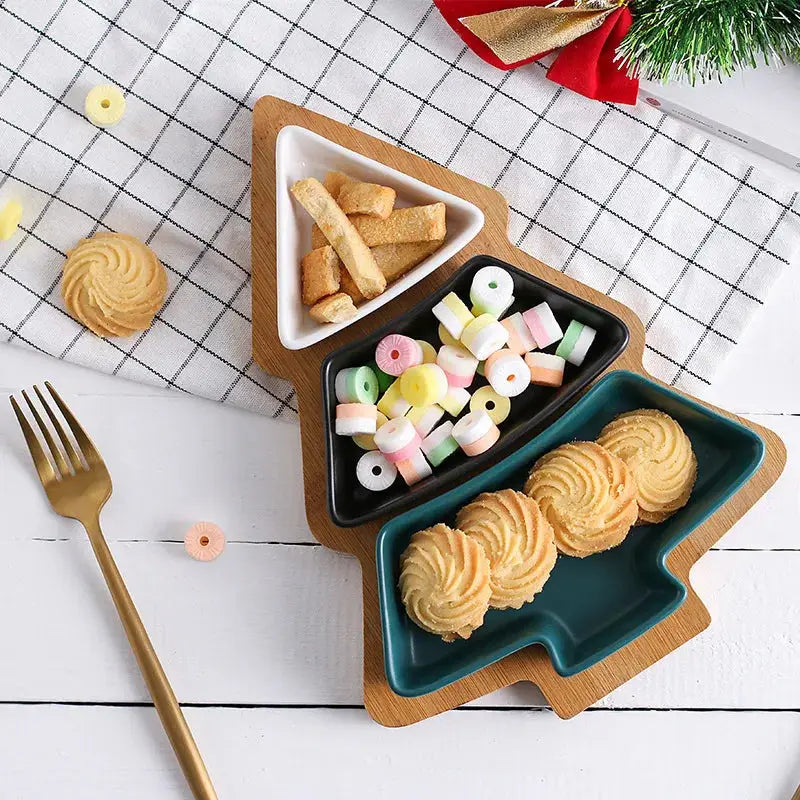 a tray with cookies, marshmallows, and other snacks