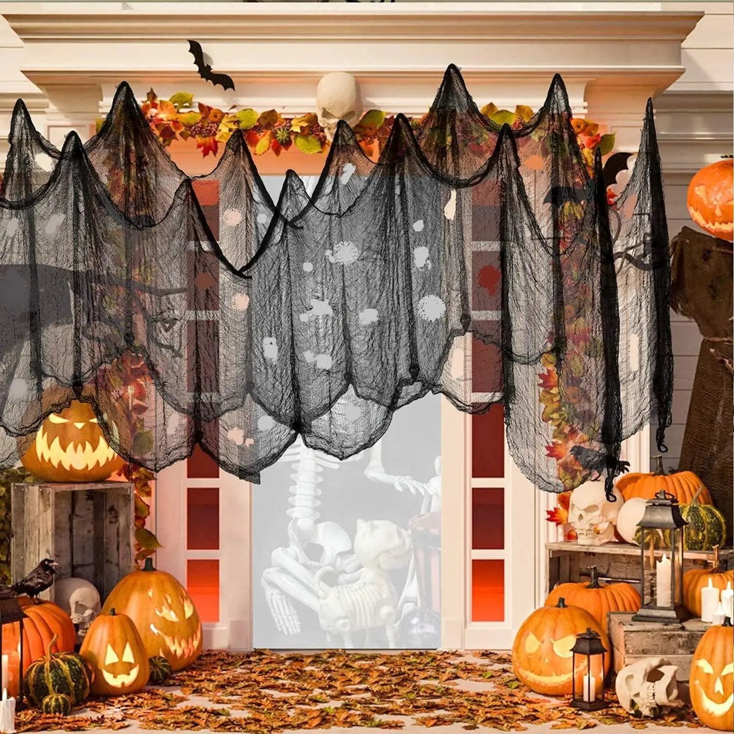 a halloween scene with pumpkins and bats