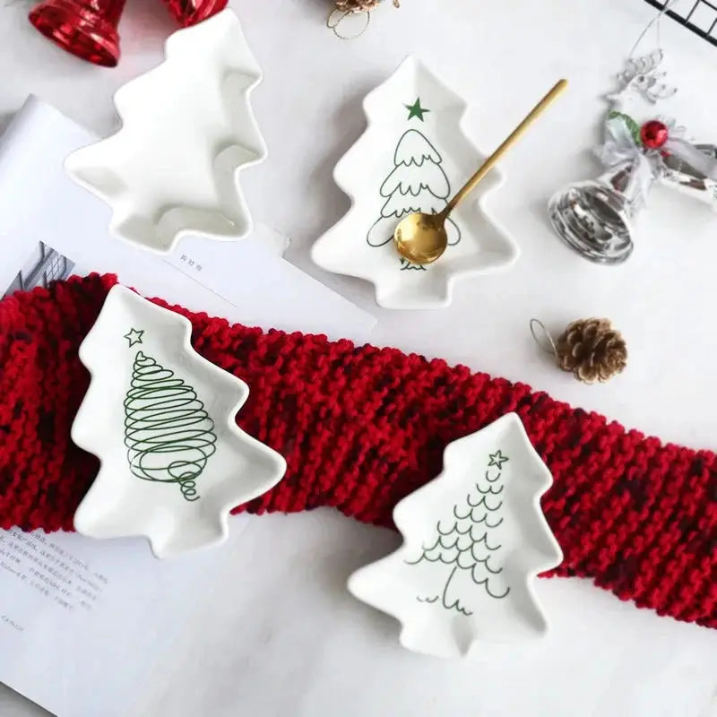 a knitted red and white scarf with christmas trees on it