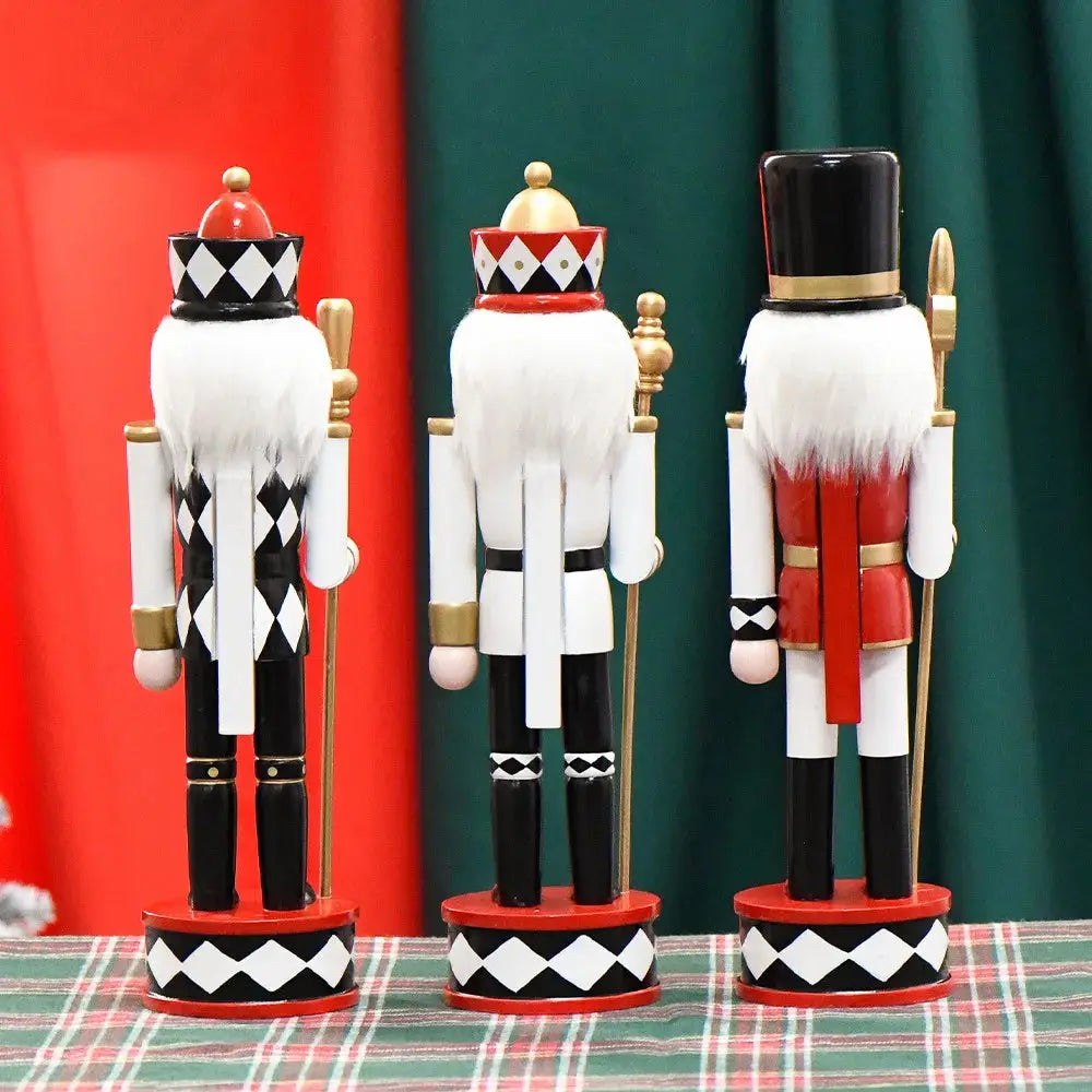 three nutcrackers are standing on a table