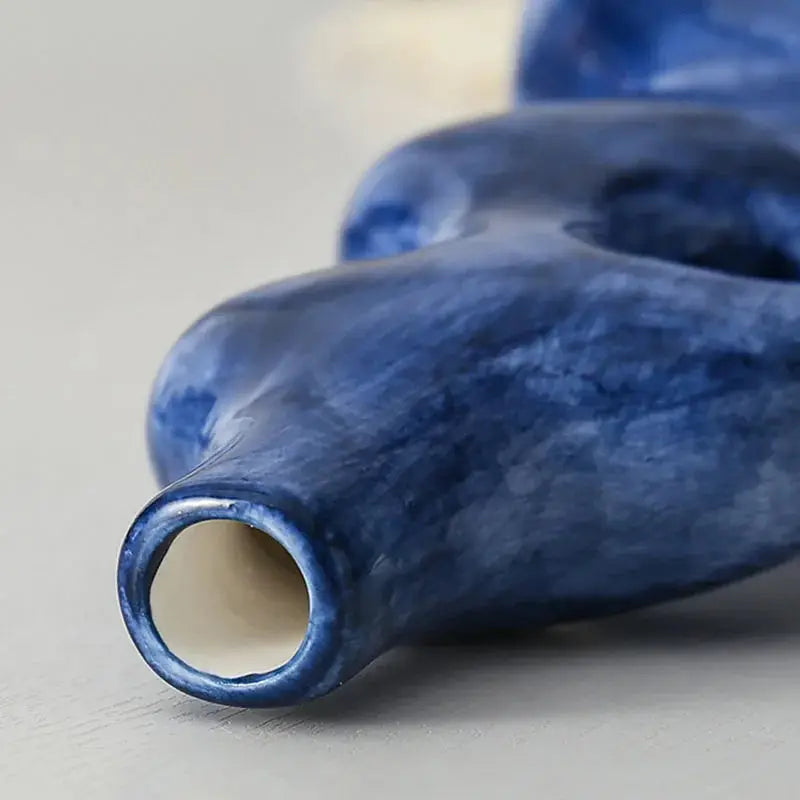 a close up of a blue object on a table