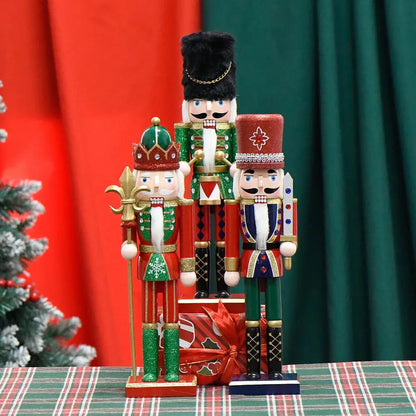 two nutcrackers are standing next to a christmas tree