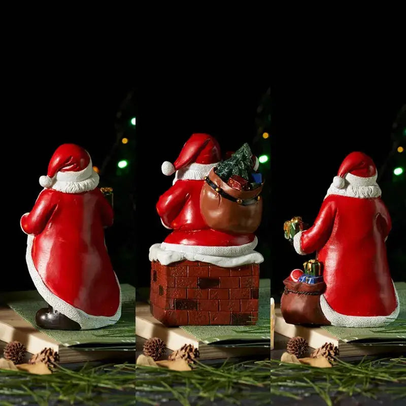 a group of santa clause figurines sitting on top of a table