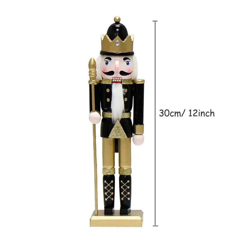 a gold and black nutcracker with a cane