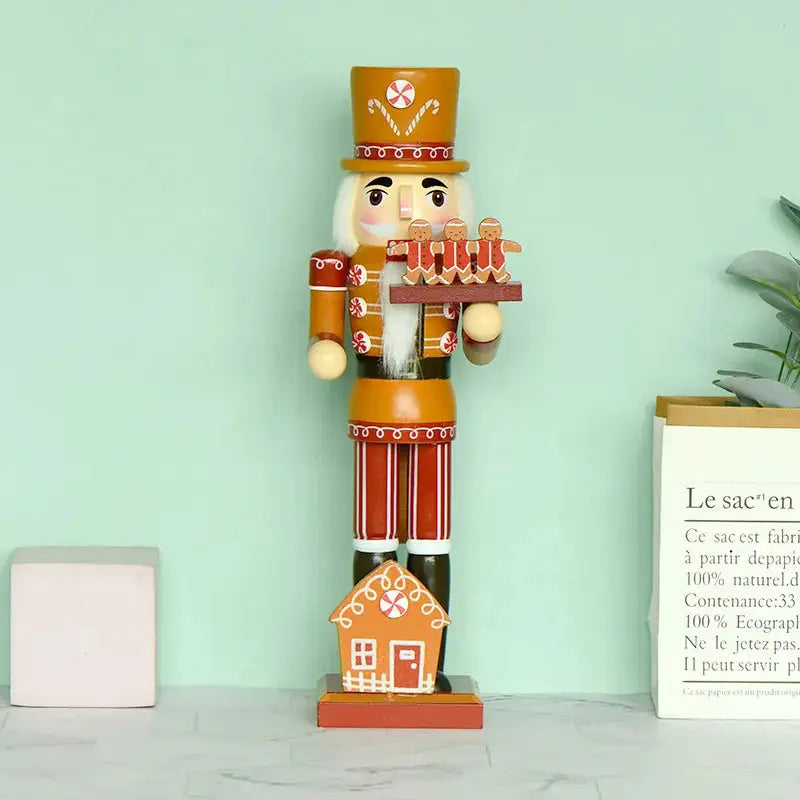 a wooden nutcracker with a house on it