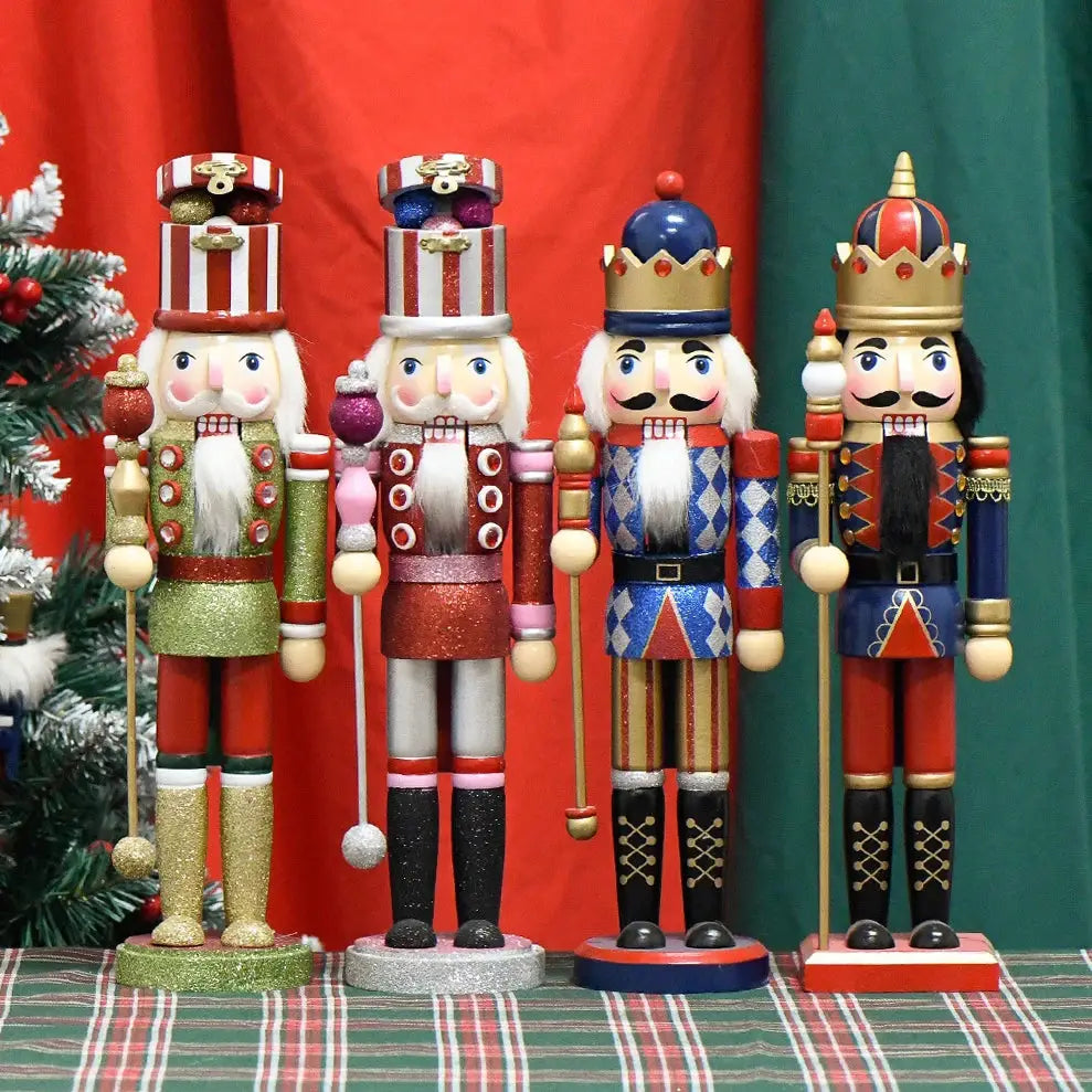 a group of nutcrackers standing next to a christmas tree