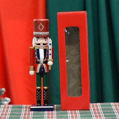 a toy soldier next to a red box